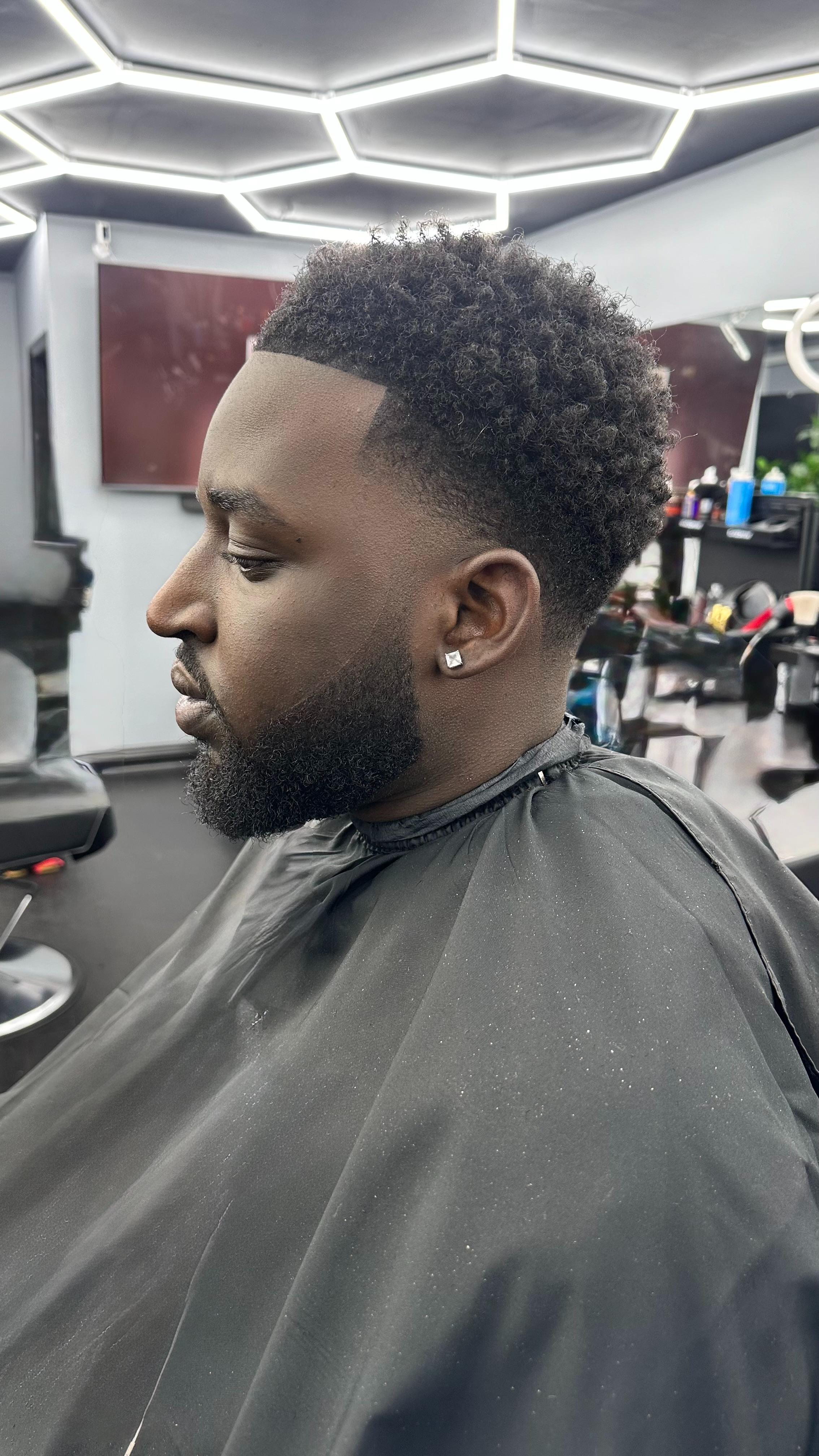 Afro fade with beard sculpt