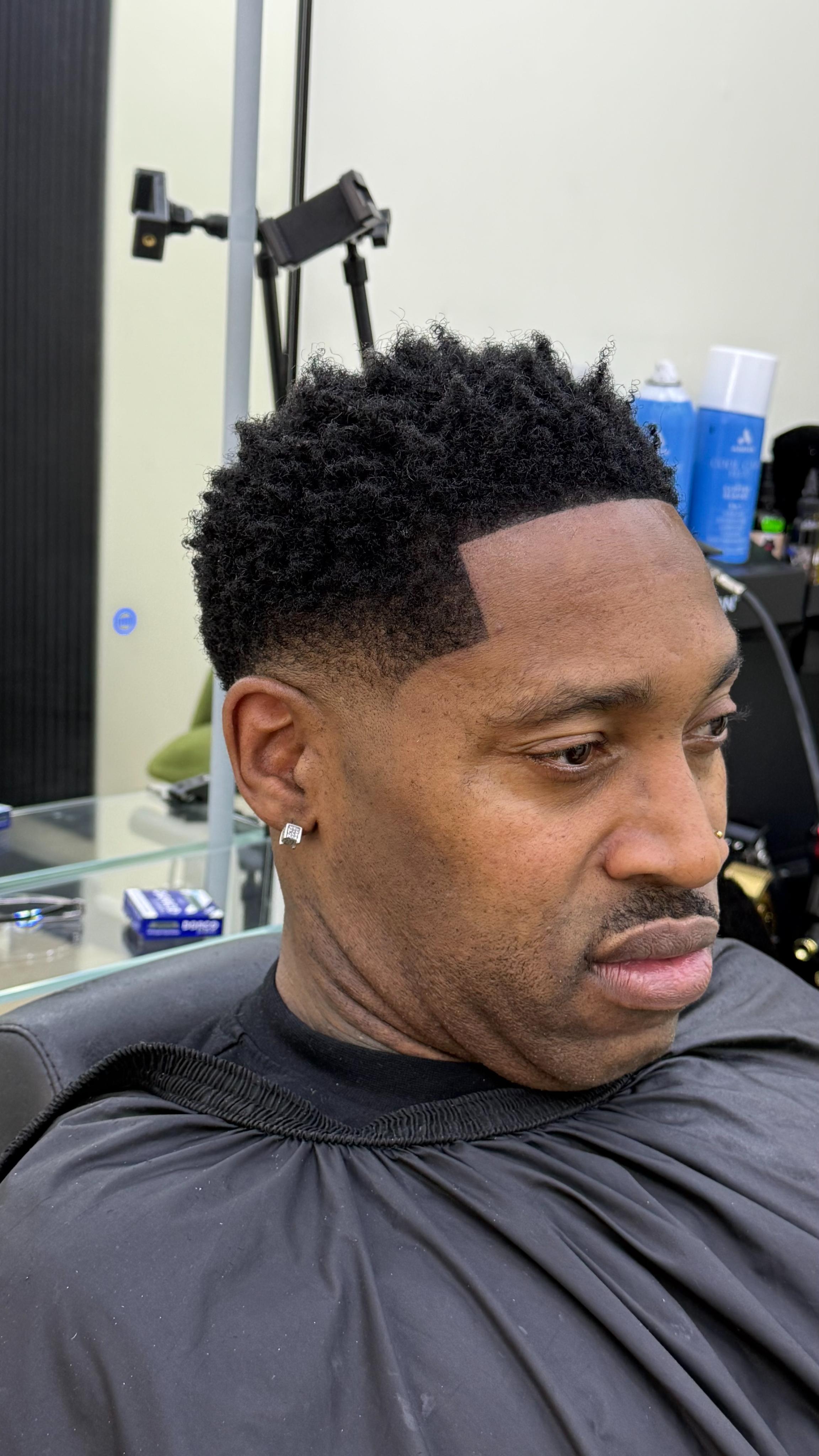 Afro top with sharp fade and lineup